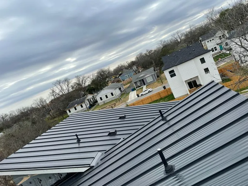 Standing seam metal roof panels with vents for Skylight Repair in Menomonee Falls